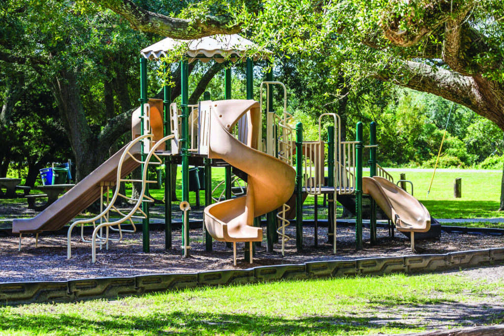 Green and Brown Playground in Public Park - Thomas Fox Landscaping